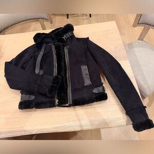 Juicy Couture Black Faux Leather Jacket with Fur lining.